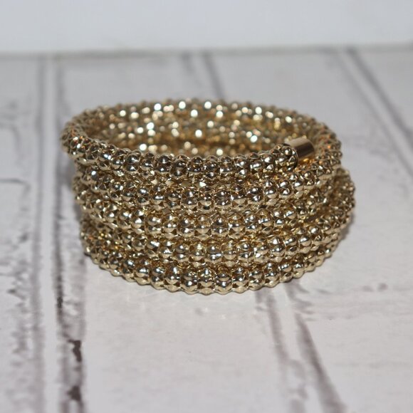 Beautiful gold bangle coil bracelet *fits most wrists sizes* - Picture 3 of 4